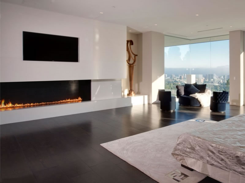 Diseño de chimeneas a gas natural en Piedra para exteriores e interiores en Bogotá, Colombia. Sortilegio Design Center SAS.